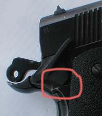 Thanks to Prohazka for pointing this problem out to me and for taking this photo.  The Mueschke safety in the photo wouldn't fit on either side of the pistol.